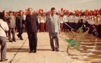 (Center, right): Pol Pot, Prime Minister and Secretary of Communist Party of Kampuchea (CPK) with Wang Dong Xing, Deputy Head of Chinese Communist Party’s Central Committee. (Behind Wang Dong Xing): Khieu Samphan, President of State’s Presidium of Democratic Kampuchea. (First from left): Hu Yao Bang, General Secretary of Chinese Communist Party’s Central Committee. (Second from left): Nuon Chea, President of People’s Representative Assembly and Deputy Secretary of Communist Party of Kampuchea. On Friday 16 November, 2018, the Khmer Rouge Tribunal convicted Nuon Chea and Khieu Samphan of genocide, crimes against humanity and grave breaches of the Geneva Conventions of 1949. The crimes were committed at various locations throughout Cambodia during the Democratic Kampuchea period from 17 April 1975 to 6 January 1979. The Trial Chamber sentencing both Nuon Chea and and Khieu Samphan to life imprisonment. Pol Pot became prime minister of Democratic Kampuchea in 1976 and resigned in 1979, but remained an active leader of the Khmer Rouge. He lived in exile, mainly in Thailand, until his death in Anlong Veng district, Oddar Meanchey province, on April 15, 1998. His body was cremated on 17 April, 1998. Source: Documentation Center of Cambodia’s Archives